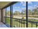 Private balcony overlooking lush landscape at 2700 Cove Cay Dr # 2F, Clearwater, FL 33760