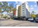 Condo building with covered parking and landscaping at 2700 Cove Cay Dr # 2F, Clearwater, FL 33760
