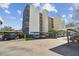 Condo building exterior with covered parking at 2700 Cove Cay Dr # 1-2F, Clearwater, FL 33760