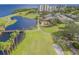 Aerial view of golf course and clubhouse at 2700 Cove Cay Dr # 2F, Clearwater, FL 33760