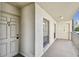 Condo hallway with access to unit 2F at 2700 Cove Cay Dr # 1-2F, Clearwater, FL 33760