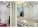 Bathroom with vanity area, mirror, and closet space at 11231 Dollar Lake Dr # 6, Port Richey, FL 34668