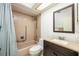 Simple bathroom featuring a bathtub, toilet, and vanity at 11231 Dollar Lake Dr # 6, Port Richey, FL 34668