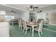 Dining area with a stylish table and chairs, perfect for Gathering meals at 11231 Dollar Lake Dr # 6, Port Richey, FL 34668
