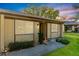 Charming one-story home with well-manicured lawn and inviting curb appeal nestled under a colorful sky at 11231 Dollar Lake Dr # 6, Port Richey, FL 34668