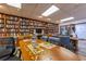 Inviting library with large table perfect for puzzles or group activities at 11231 Dollar Lake Dr # 6, Port Richey, FL 34668