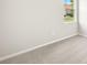 Bedroom with neutral carpet and view to the yard at 11726 Renaissance Blvd, Venice, FL 34293