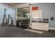 Well-equipped fitness center with free weights, weight machines, and a water cooler at 11726 Renaissance Blvd, Venice, FL 34293
