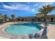 Community pool with a spa and plenty of deck space at 11726 Renaissance Blvd, Venice, FL 34293