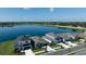 Aerial view of new homes with lake views at 11846 Mile Marsh Dr, Riverview, FL 33569