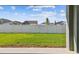 Backyard view showing a well-maintained lawn and a privacy fence at 11846 Mile Marsh Dr, Riverview, FL 33569