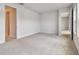 Empty carpeted bedroom with white walls and baseboards, awaits your personal touches and furniture at 11846 Mile Marsh Dr, Riverview, FL 33569