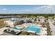 Aerial view of a community pool with lap lanes and a water slide at 11846 Mile Marsh Dr, Riverview, FL 33569