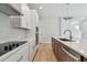 Well-appointed kitchen with modern appliances, stylish countertops, and ample storage space at 11846 Mile Marsh Dr, Riverview, FL 33569