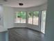 Dining area has large windows and sliding glass doors providing view to the backyard at 12186 Lamont Dr, Spring Hill, FL 34608