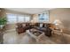 Living room with comfortable couch, ocean views, and elegant coffee table at 1230 Gulf Blvd # 402, Clearwater Beach, FL 33767