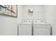 The laundry room includes a Whirlpool washer and dryer at 17463 Whiskey Creek Trl, Parrish, FL 34219