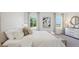 Large Primary bedroom with lots of natural light, a comfortable bed, and stylish decor at 17463 Whiskey Creek Trl, Parrish, FL 34219