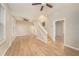 Living room featuring hardwood floors and a staircase at 1910 E Columbus Dr, Tampa, FL 33605