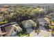 Two-story house with a three-car garage and large backyard at 2212 Valterra Vista Way, Valrico, FL 33594