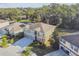 Two-story house with a three-car garage and large backyard at 2212 Valterra Vista Way, Valrico, FL 33594