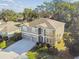 Two-story house, three-car garage, and large backyard at 2212 Valterra Vista Way, Valrico, FL 33594