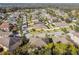 Neighborhood view showcasing various houses and landscaping at 2212 Valterra Vista Way, Valrico, FL 33594