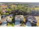 Two-story house with a three-car garage and large backyard at 2212 Valterra Vista Way, Valrico, FL 33594