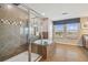 Spa-like bathroom with a large shower, garden tub, and double vanity at 2212 Valterra Vista Way, Valrico, FL 33594