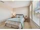 Serene bedroom with light walls and ample natural light at 2212 Valterra Vista Way, Valrico, FL 33594