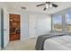 Bedroom with a queen bed and access to a hallway at 2212 Valterra Vista Way, Valrico, FL 33594