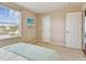 Bedroom with large window, closet, and access to bathroom at 2212 Valterra Vista Way, Valrico, FL 33594