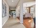 Tile entryway with views of dining room and staircase at 2212 Valterra Vista Way, Valrico, FL 33594