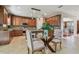 Modern kitchen with wood cabinets, stainless steel appliances, and tile floors at 2212 Valterra Vista Way, Valrico, FL 33594
