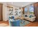 Spacious living room featuring hardwood floors and a neutral color palette at 2212 Valterra Vista Way, Valrico, FL 33594