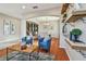 Open living room with a view into the dining room and hardwood floors at 2212 Valterra Vista Way, Valrico, FL 33594