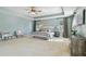 Main bedroom with large bed, plenty of space, and natural light at 2212 Valterra Vista Way, Valrico, FL 33594
