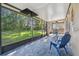 Spacious screened patio overlooking grassy backyard at 2212 Valterra Vista Way, Valrico, FL 33594