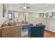 Spacious upstairs lounge with comfortable seating and wood flooring at 2212 Valterra Vista Way, Valrico, FL 33594
