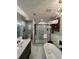 Elegant bathroom with soaking tub, double vanity, and walk-in shower at 2765 Mauritania Rd, Punta Gorda, FL 33983