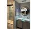 Bright bathroom with double vanity and updated lighting at 2765 Mauritania Rd, Punta Gorda, FL 33983