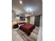 Main bedroom with barn door and plush bedding at 2765 Mauritania Rd, Punta Gorda, FL 33983