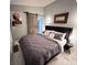 Spacious bedroom with a barn door and modern decor at 2765 Mauritania Rd, Punta Gorda, FL 33983