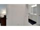 Clean bathroom with white vanity, shower, and a blue patterned shower curtain at 31451 Moniker Mast Ln, San Antonio, FL 33576