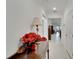 Bright and airy entryway with decorative table at 31451 Moniker Mast Ln, San Antonio, FL 33576
