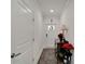 Bright entryway with light-colored walls and flooring at 31451 Moniker Mast Ln, San Antonio, FL 33576