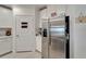 Stainless steel refrigerator in kitchen at 31451 Moniker Mast Ln, San Antonio, FL 33576