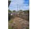 Fenced backyard, partially covered in grass at 4150 15Th S Ave, St Petersburg, FL 33711