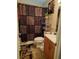 Bathroom with animal print decor, wooden vanity, and shower/tub combo at 4150 15Th S Ave, St Petersburg, FL 33711