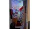 Bathroom featuring dual sinks, colorful lighting, and patterned shower curtain at 4150 15Th S Ave, St Petersburg, FL 33711